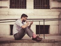 brown leather shoes, man, earphones, fashion, male, model, person, smartphone, leisure, sitting, urban, brown city, brown phone, brown fashion, brown mobile, brown model, brown shoes, brown smartphone, brown telephone, earphones, smartphone, smartphone, smartphone, smartphone, smartphone